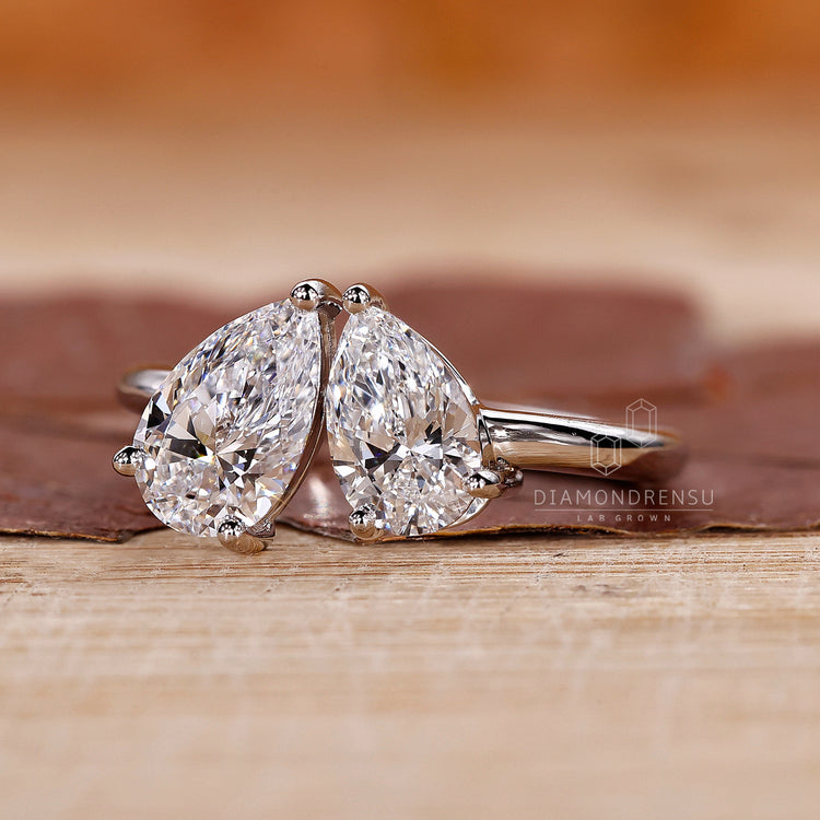 White Gold Engagement Ring with a stunning pear shaped diamond.