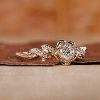 Diamondrensu nature-inspired engagement ring with a round diamond set in yellow gold