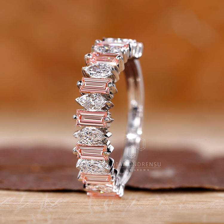 Pink Baguette Cut diamonds set in a stylish white gold wedding band.