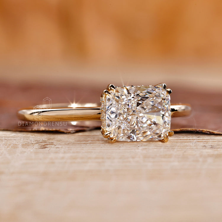 Round diamond in hidden halo yellow gold engagement ring