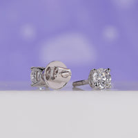 Sophisticated diamond stud earrings with brilliant craftsmanship.