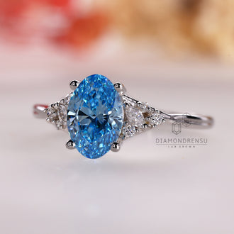 Marquise Cut Ring with a blue diamond for modern flair.