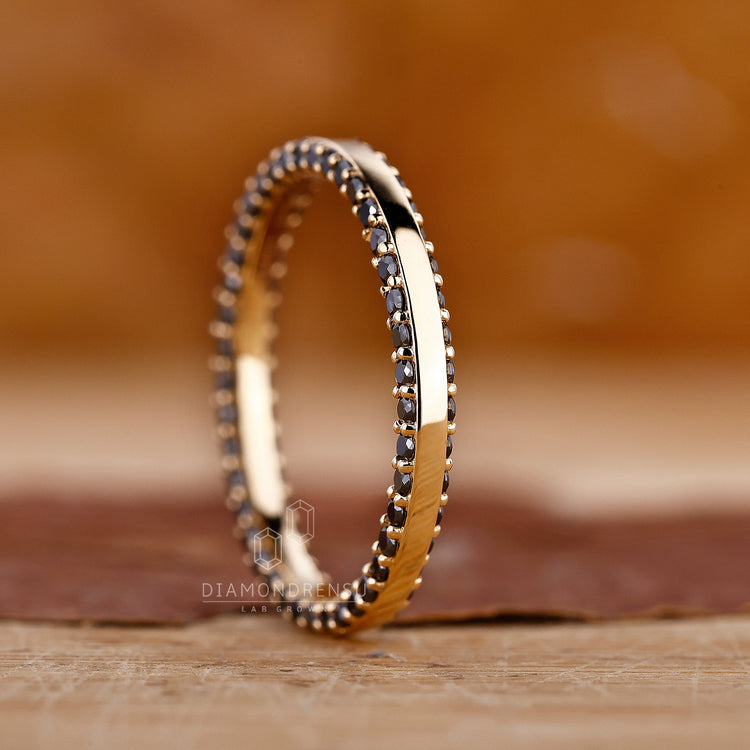 Black diamond wedding band with a bold and modern look.