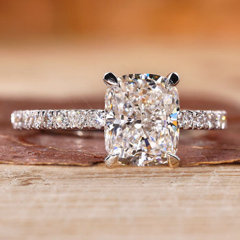 Pave Setting Ring featuring a flawless round diamond.