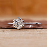 Sparkling blue diamond set in a stunning ring.