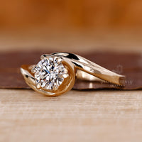 Handmade ring with solitaire diamond engagement ring.
