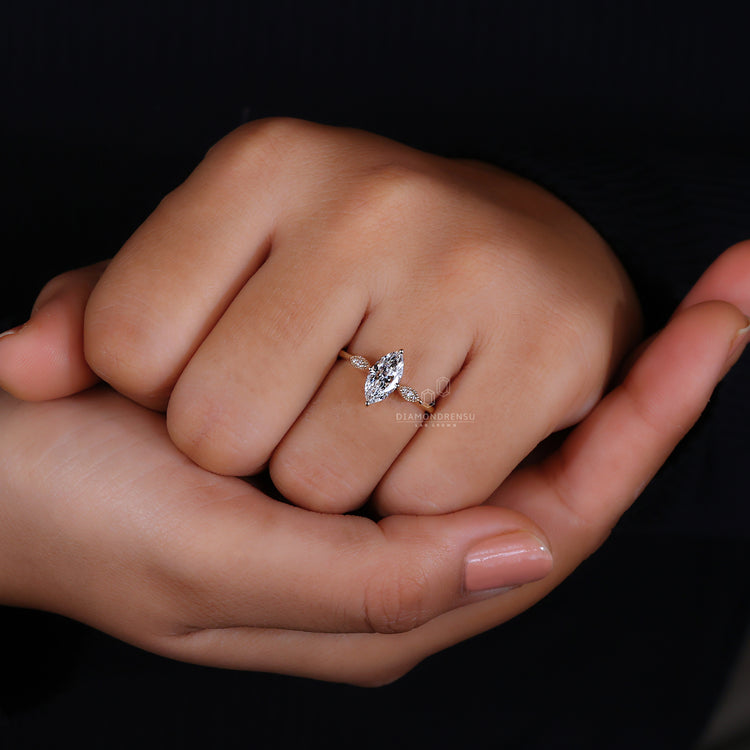Prong setting on a marquise diamond ring for secure elegance.
