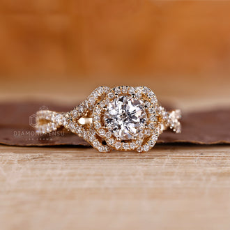 Unique Jubilee cut diamond engagement ring with round side stones.