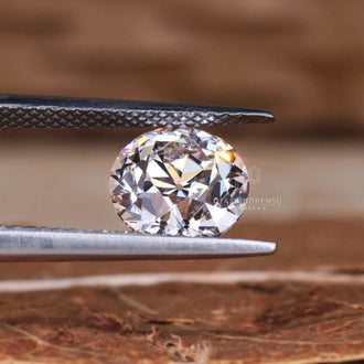 Lab grown diamond featured in round Old European cut design.