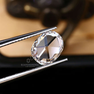 Loose lab grown diamond with a rose cut elongated cushion cut and 1.45 carats.