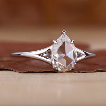 Pear Shaped Diamond Ring with stunning sparkle and elegance.