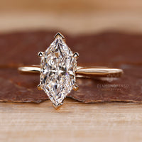 Yellow gold diamond ring with custom engagement ring.