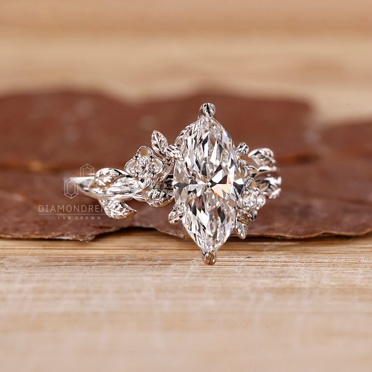 Six-leaf style prong setting for a marquise diamond, offering a unique and secure hold.