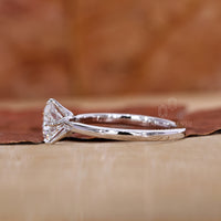 Round Diamond Ring set in a secure prong setting.