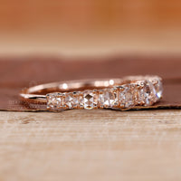 Shared Prong Setting Wedding Band for a secure fit.