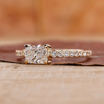 East West Engagement Ring with a stunning radiant cut diamond.