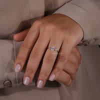 Elegant oval diamond engagement ring with precision.