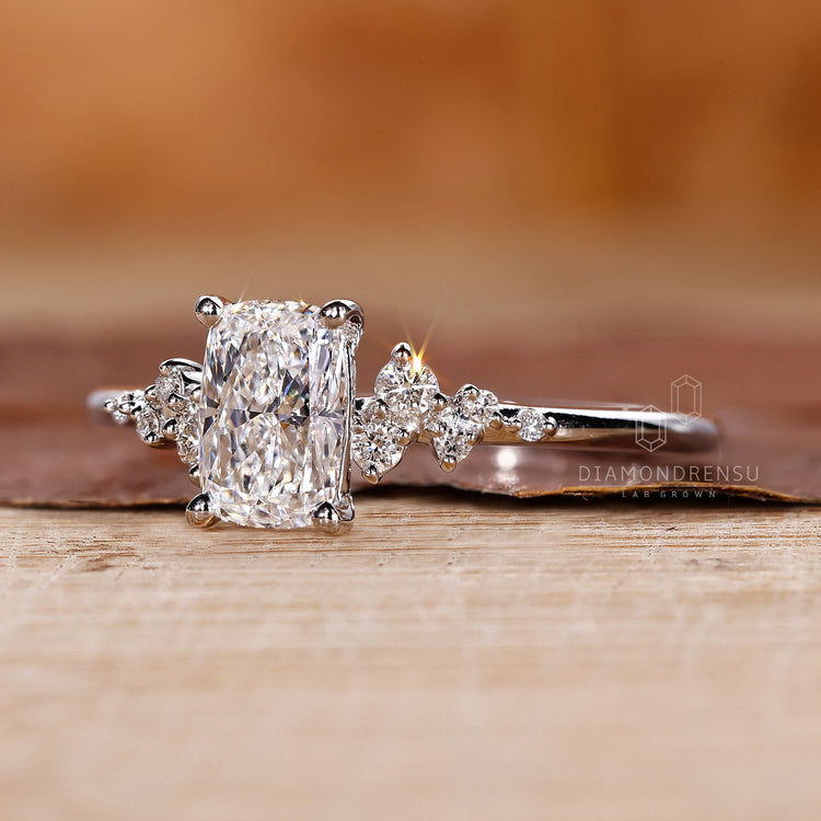 Handmade ring with an elongated cushion cut diamond, perfect for proposals.