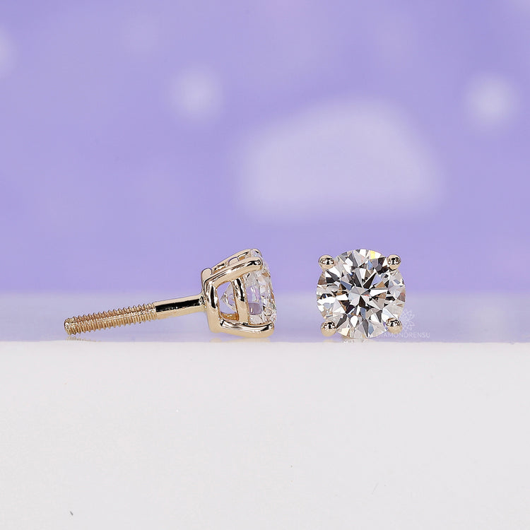 Luxurious gold diamond earrings for an elegant statement.