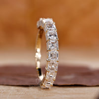 Yellow gold wedding band with Asscher cut.