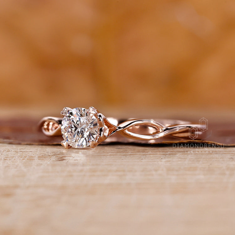Rose Gold Ring with a unique and secure diamond setting.