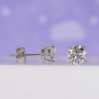2 ct diamond earrings with screw back earrings for secure and comfortable wear.