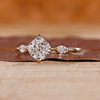 Yellow gold ring with 3 stone diamond design.