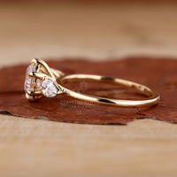 Classic three stone diamond ring in yellow gold, reflecting timeless beauty and sophistication.