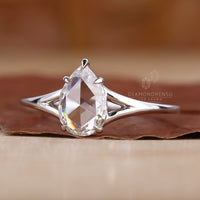 Pear Diamond Ring featuring a classic and unique design.