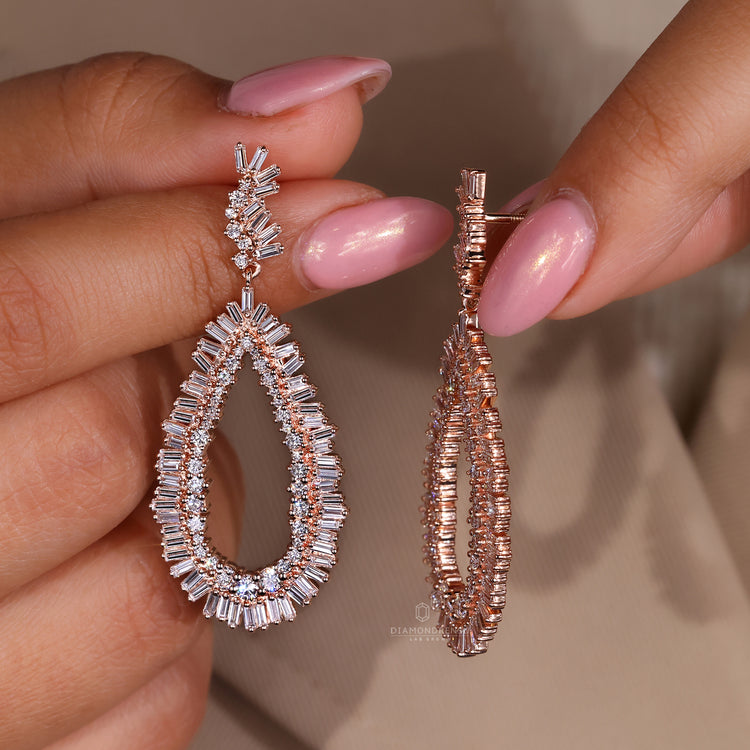 Large teardrop earrings with baguette cluster accents