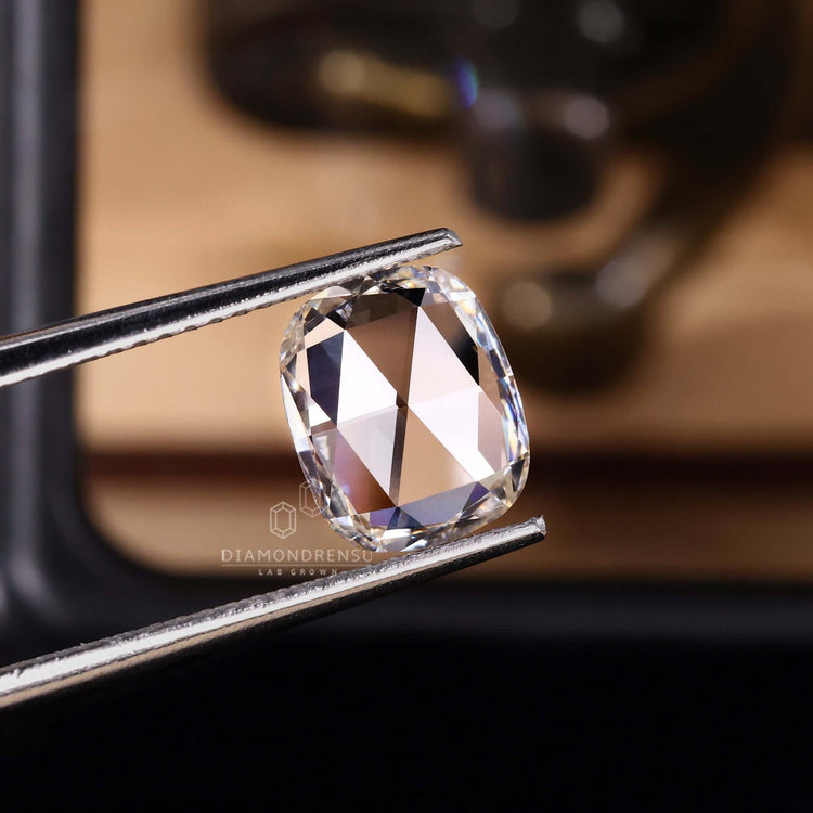 Lab created diamond in antique flat cushion cut style.
