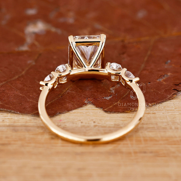 5 stone diamond ring with radiant cut diamonds for a dazzling effect.