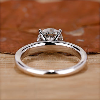 White Gold Ring showcasing the beauty of a round diamond.