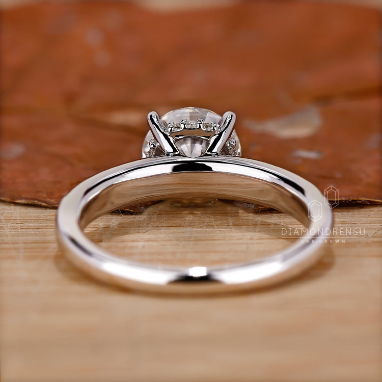 White Gold Ring showcasing the beauty of a round diamond.