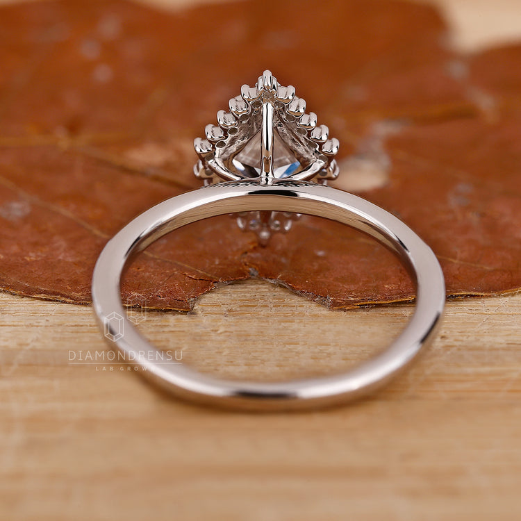 White Gold Ring with a polished finish and intricate detailing.