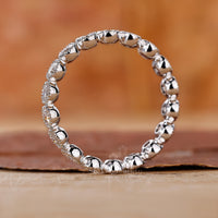 Eternity Wedding Band showcasing continuous diamond sparkle.
