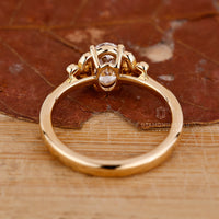 Yellow gold ring featuring an oval diamond for a classic yet modern look.