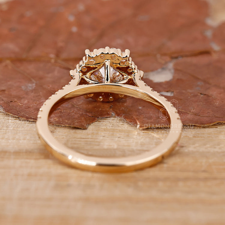 Yellow Gold Ring featuring a cushion cut diamond for warmth.