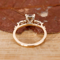 Stunning emerald engagement ring with vibrant green hues and style