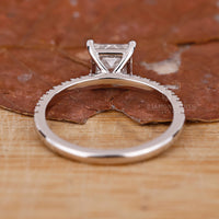 Buy diamond ring with a princess cut and pave setting.