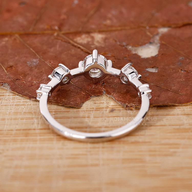 White Gold Ring showcasing five stunning round diamonds.