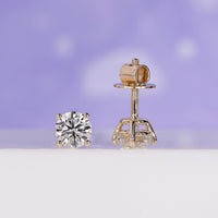 Gorgeous round cut diamond earrings for a sophisticated look.