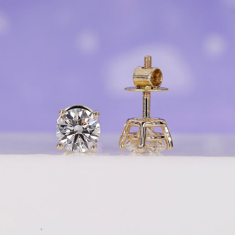 Durable yellow gold diamond stud earrings with secure earring prongs.