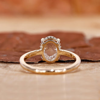 Yellow Gold Engagement Ring with an exquisite oval diamond.