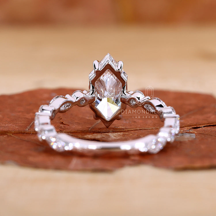 Marquise Side Stone Ring with diamondrensu ring craftsmanship.