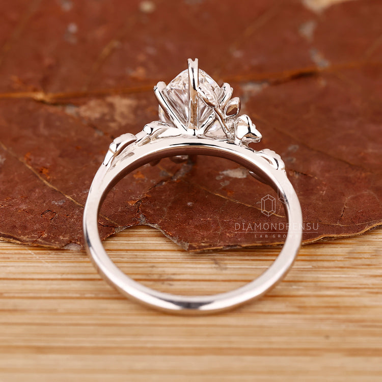 Buy lab-grown ring with a marquise diamond, offering an ethical and affordable option.