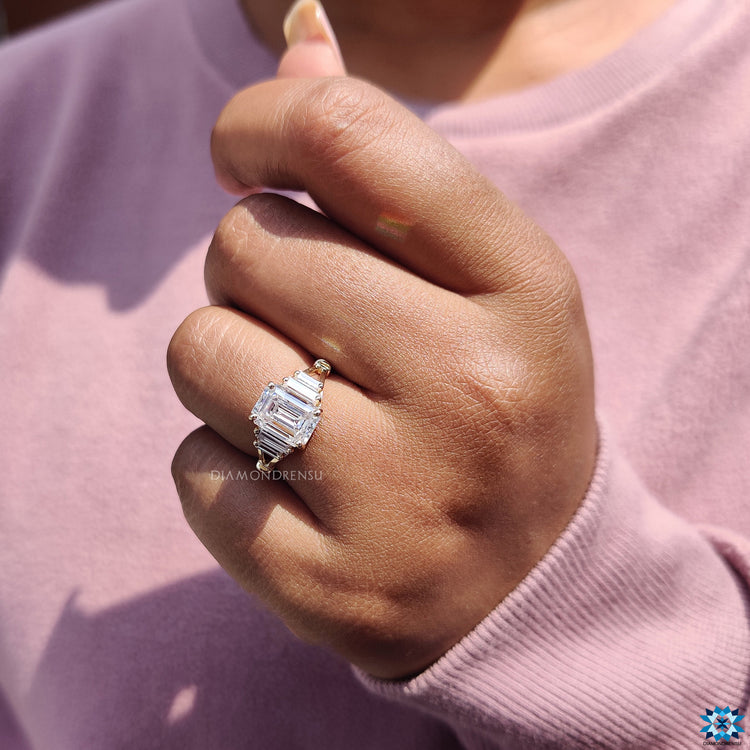 Split shank ring with moissanite centerpiece.