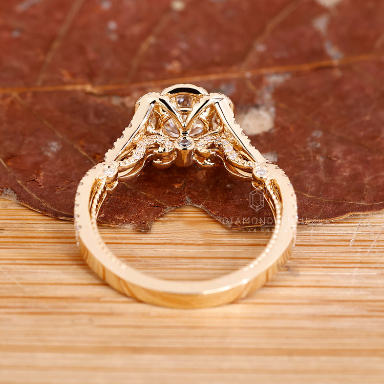 Diamondrensu halo engagement ring with Jubilee cut and yellow gold setting.
