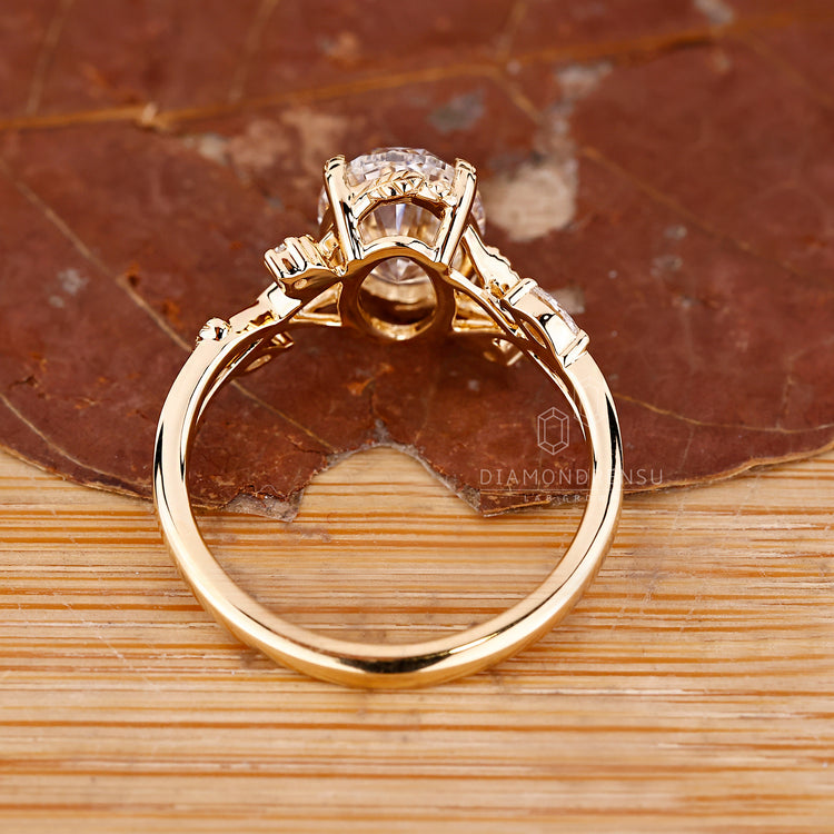 Custom oval diamond engagement ring.