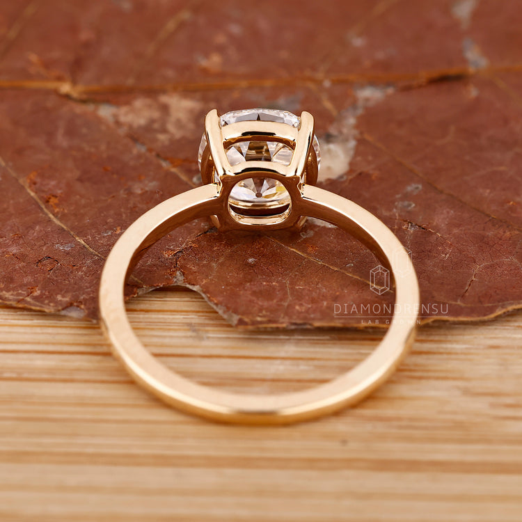 Handmade jewelry featuring cushion cut diamond.